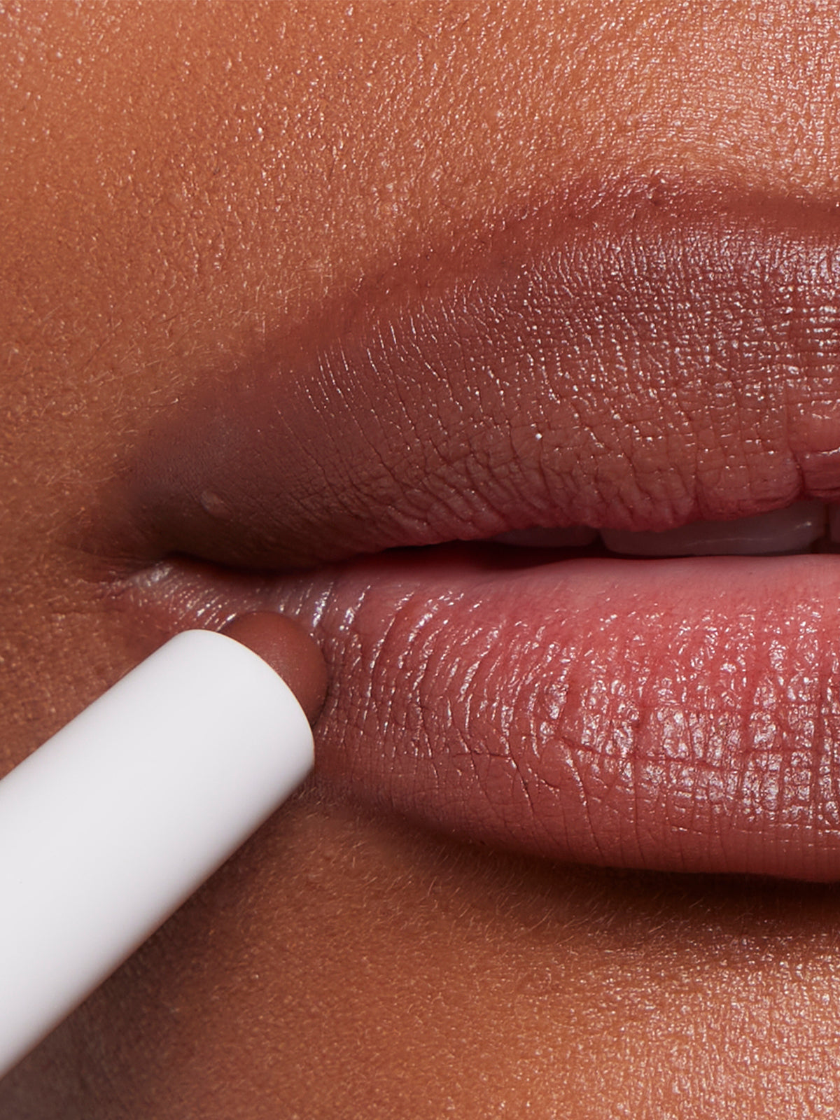 | desc: | text: light Blur Liner in shade Umber
