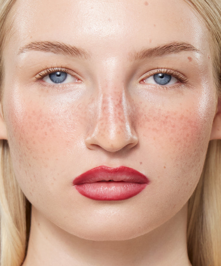| desc: Model wears Lip Sculpt in Red