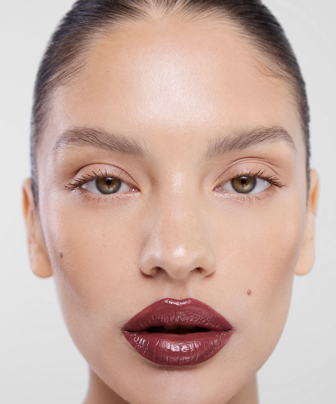 | desc: Barbara wears shade Mulberry